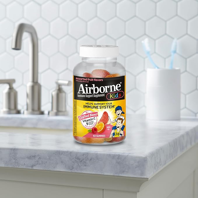 Airborne Vitamin C 500mg (per Serving) - Assorted Fruit Flavored Kids Gummies (63 Count in a Bottle), Gluten-Free Immune Support Supplement with Vitamins C E, Selenium